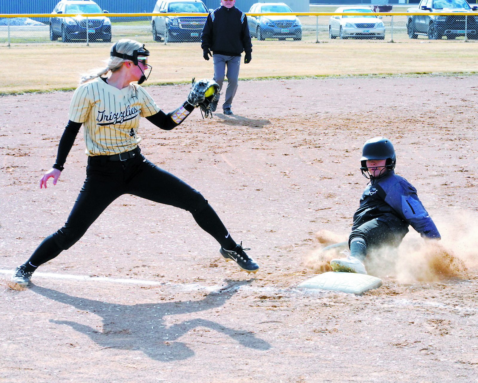 Raeleigh Ratzlaff beats the tagout at 3rd base by getting there first. Photo by Larry Stokke.