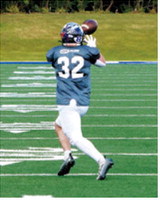 Kade Schafer makes a catch and races for a first down for the East nine-man team during the Shrine Bowl in Mayville on June 20. Photo by Larry Stokke