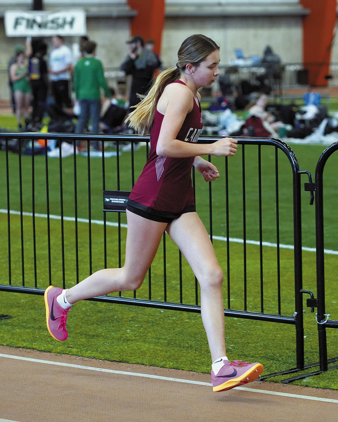 Olivia Lorenz placed 6th in the 1500 meter run at the EFG Green Wave Meet on April 19. Photo by Larry Stokke.