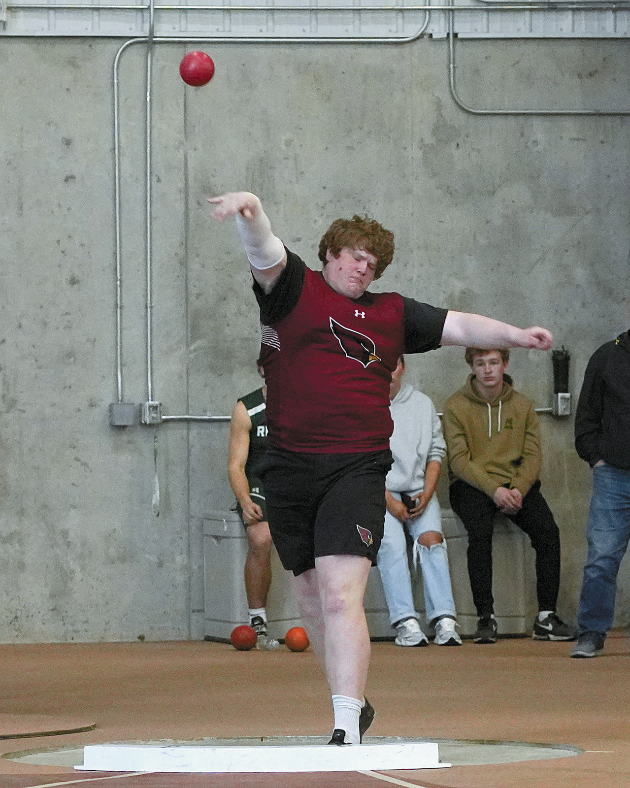 Jacob Lowery took 3rd place in the shot put at the EGF Green Wave Meet with a throw of 44' 7', his personal best. Photo by Larry Stokke.