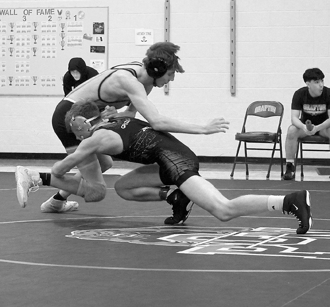 Oakley Brown won his second match by decision over his opponent. Photo by Larry Stokke.
