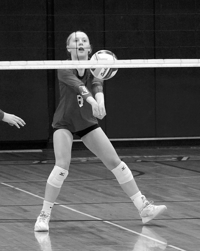 Hilary Haaven, who was player of the game for the Cardinals, passes the ball to a teammate in the win over the Eagles. Photo by Larry Stokke.
