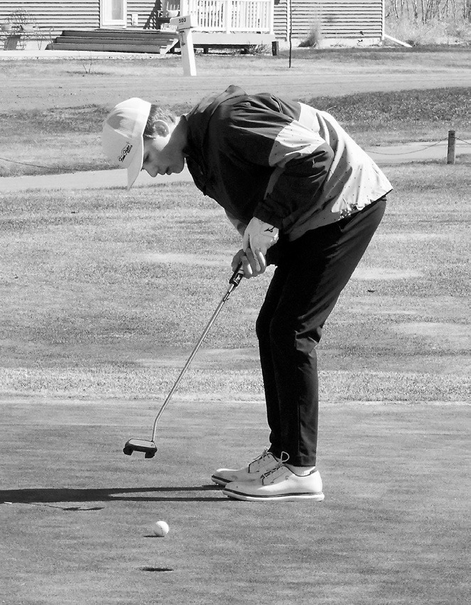 Ryland Peterson finished the meet with a score of 91, putting him in a three-way tie tor 26th place. Photo by Larry Stokke.