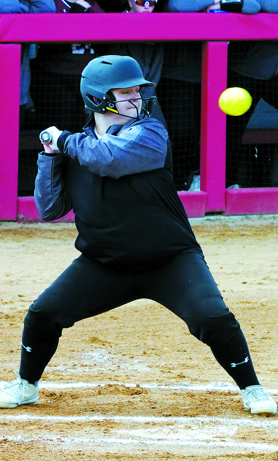 Kenadee Cluchie gets a good look at the ball before getting a hit. Photo by Larry Stokke.