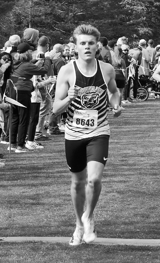 Nash Fitzsmonds had a great run at the Regional Cross Country Meet placing 7th with a time of 17:25.8. Photo by Larry Stokke.