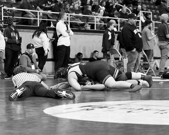 Jaelyn Forrey quickly pinned her opponent for the win at the Rumble on the Red in Fargo on Jan 2. Photo by Larry Stokke.