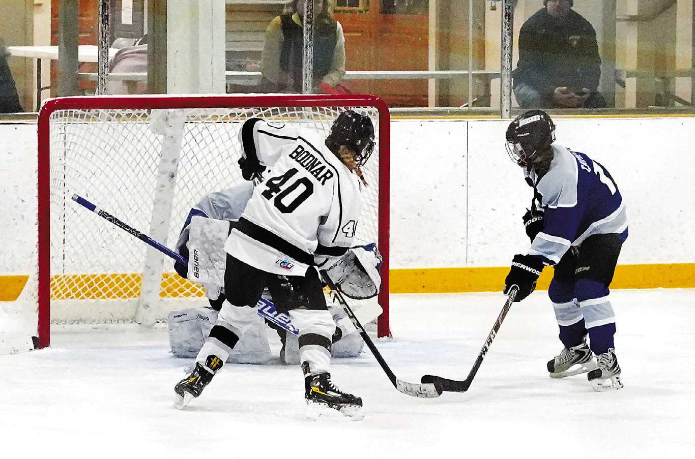 Remmi Bodnar gets in front of the goalie and fires a shot that the goalie stoped with her body. Photo by Larry Stokke.