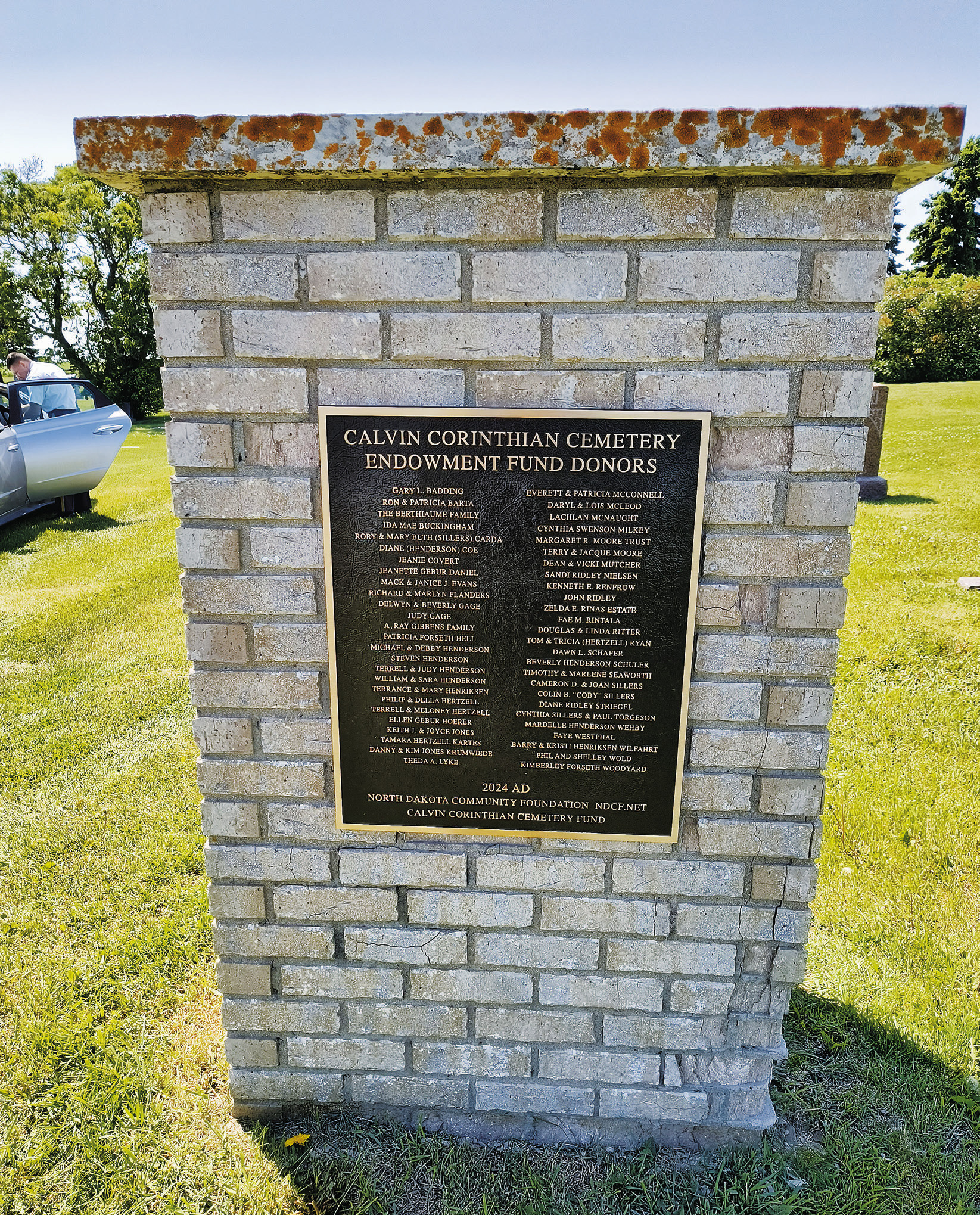 New plaque featuring the names of those who donated to the Calvin Corinthian Cemetery Fund. Photo by Terrence Henriksen.