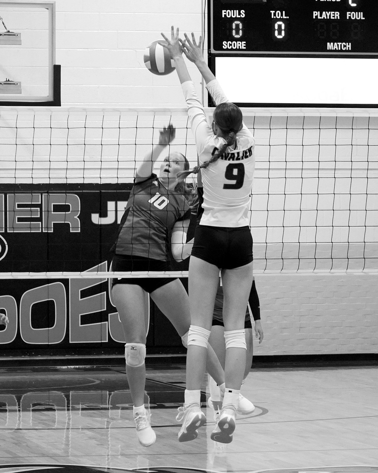 Jocelyn Anderson with a stuff block in the game against Drayton-Valley Edinburg on Oct 3. Photo by Larry Stokke.