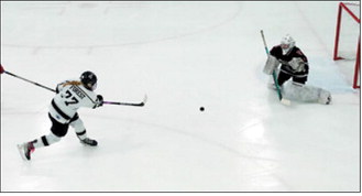 Colby Forest fires off a shot at the Oilers net Saturday, Jan. 17 in Langdon. Photo by Larry Stokke