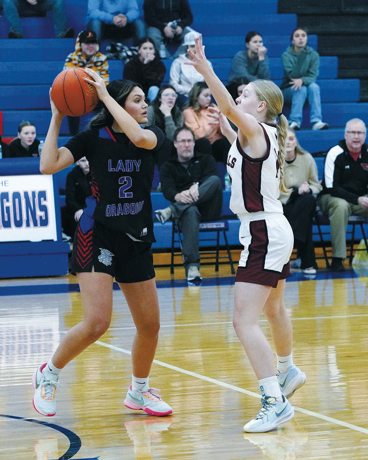 Hilary Haaven puts pressure on a Dunseith player. Photo by Larry Stokke.