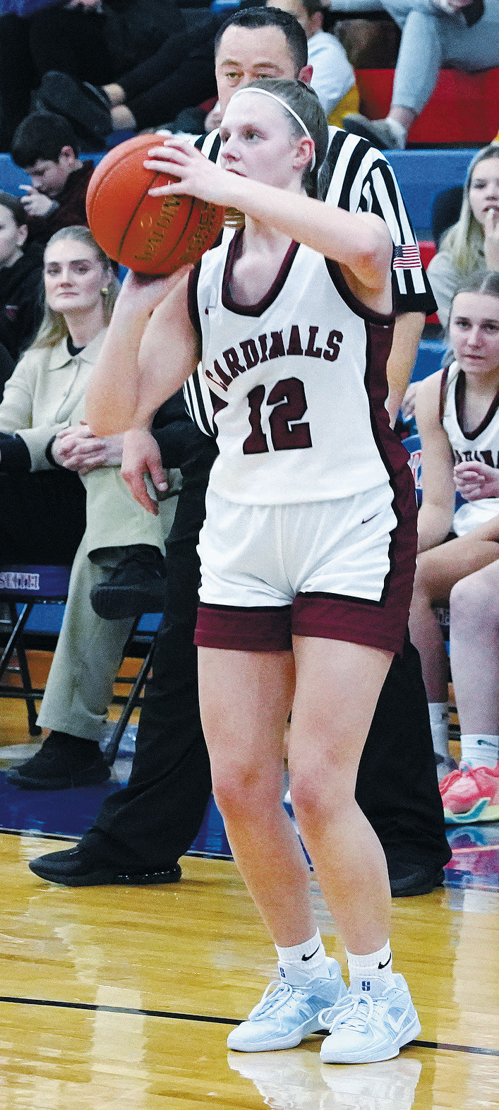 Mikaela Olson had two three-pointers and two buckets to end the night with 10 points in the win over the Dragons. Photo by Larry Stokke.