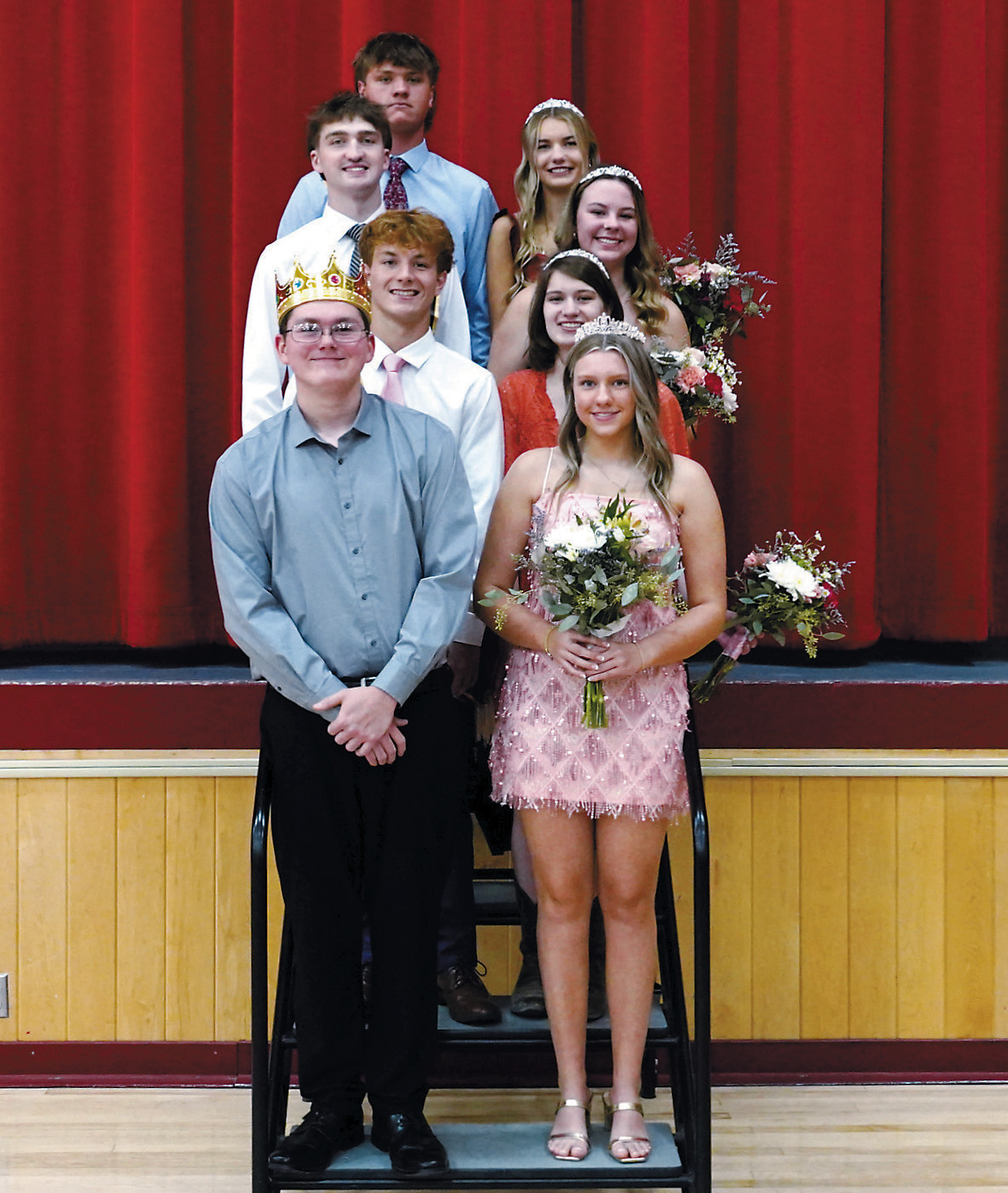 The 2025 Homecoming Court: Back row (L-R) Theo Romfo and Mya Johnson; third row: Keaton Ullyott and Madelyn Crump; second row: Sam Davis and Chloe Ottem; front row: King Brayden Harris and Queen Emma Hetler. Photo by Larry Stokke.
