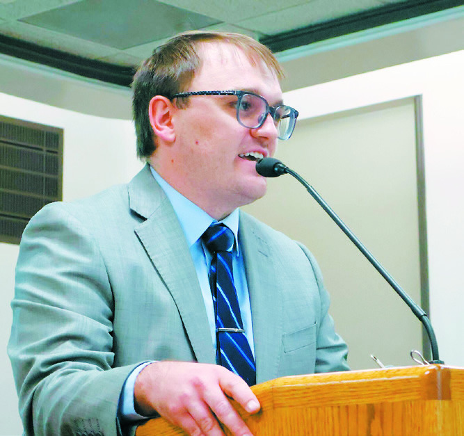 Seth O’Neill, executive director of CAWS North Dakota, delivers remarks during a meeting of the Interim Human Services Committee on July 11, 2024. (Michael Achterling/North Dakota Monitor)