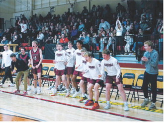 The Cardinal bench celebrates the win. Photo by Larry Stokke