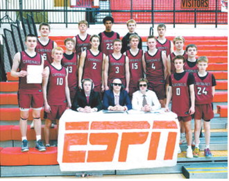 L-R: Austin Wenzel, Gavin Trottier, and Evan Ottem- dressed as ESPN announcers at the game on semi-final night. Photo by Larry Stokke