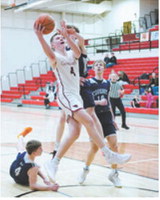 FM Bank Player of the Game Levi Swanson had a team high 21 points with four 3-point baskets to help the cards win over North Prairie. Photo by Larry Stokke