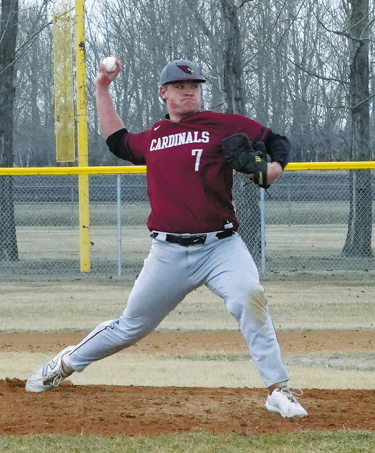 Theo Romfo winds up and strikes out a Spoiler in Grafton on April 14. Photo by Larry Stokke.