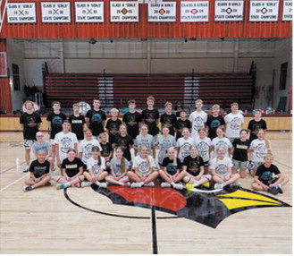 Participants in the Warwick Workouts basketball camp gather for a group photo at the conclusion of the June 8-10 camp in Langdon. The 7-12 grade session drew 35 athletes for three days of skill development, competition and instruction. Submitted photo
