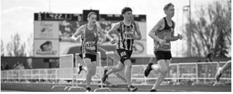 Nash Fitzsimonds races in the 3,200-meter run, posting a personal-best time of 10:27.23 to place 18th at the NDHSAA Class B State Track and Field Meet. Fitzsimonds also recorded a personal-best 4:48.15 in the 1,600 meters, finishing 20th. Photo by Ashley Schafer