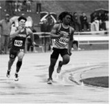 Micah Dutch sprints to a personal-best time of 23.20 seconds in the 200-meter preliminaries at the NDHSAA Class B State Track and Field Meet, finishing 14th overall. Photo by Ashley Schafer