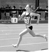 Maci Puppe clocks a personal-best time of 2:21.68 to place eighth in the 800-meter run at the NDHSAA Class B State Track and Field Meet. Photo by Larry Stokke