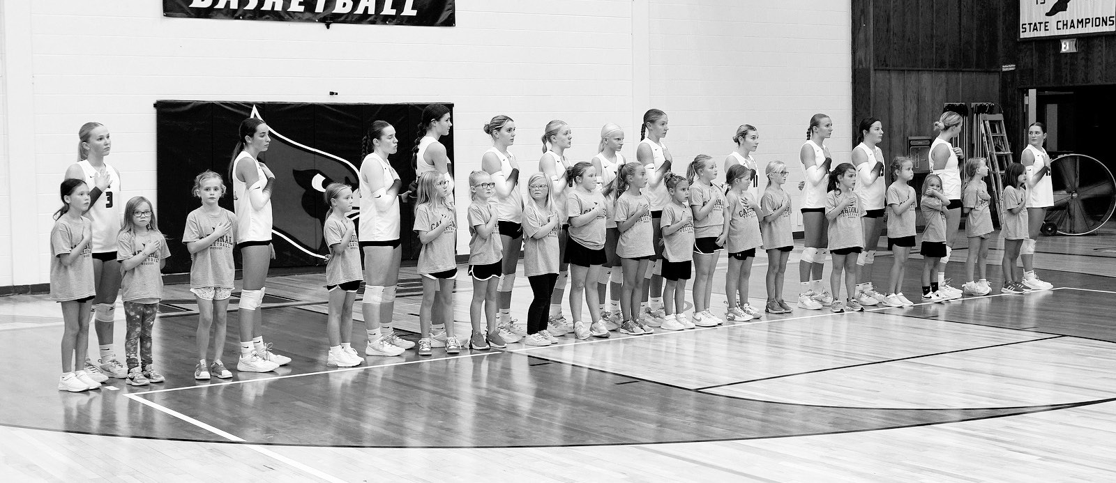 It was 'Volleyball Buddy Night' at the Cards home game versus North Prairie. Photo by Larry Stokke.