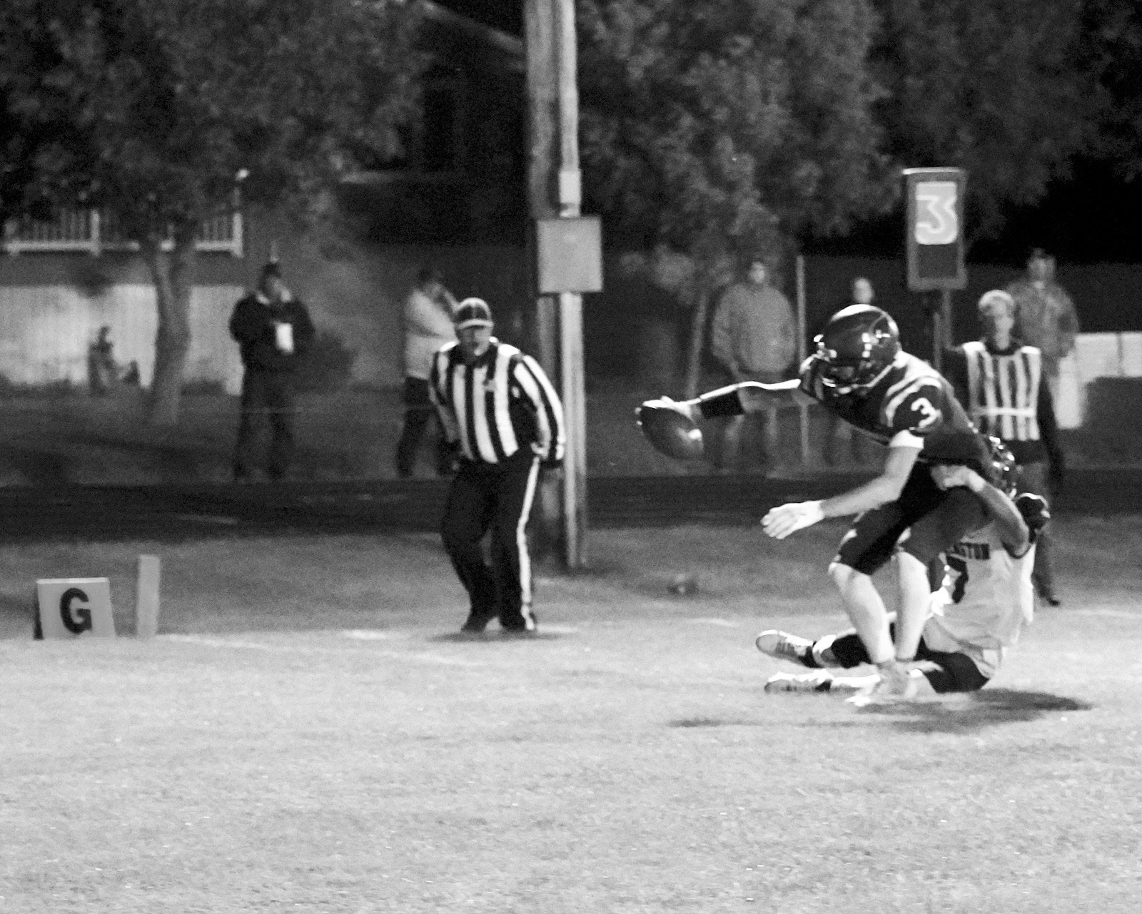 Cody Amble stretches out and crosses the goal line to score for the Cards against Carrington. Photo by Larry Stokke.
