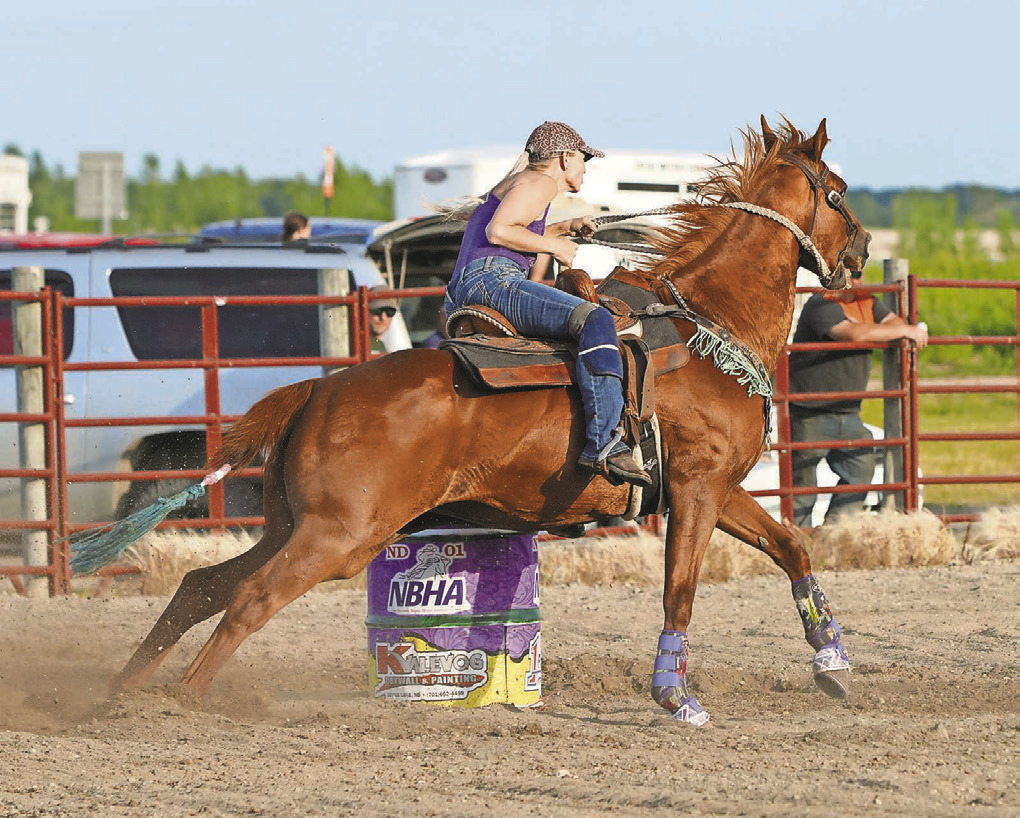 Cyndi Hummel on BLR Balto round the second barrel in Devils Lake on June 24.