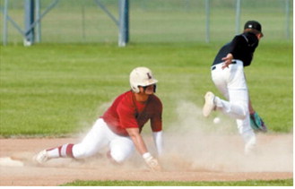 Theo Romfo slides safely into second base during Langdon's win over Midway-Minto on July 14. Photo by Larry Stokke