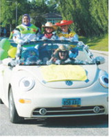 Kathy Kramer, Connie Kjos and family members dressed as characters from Disney and Pixar’s Toy Story as they drove down Main Street, greeting everyone with candy and smiles. Photo by Larry Stokke