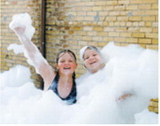 Foam-filled fun. Two youngsters enjoy the foam pit during Langdon’s Pre-Blast Bash celebration July 3. The popular attraction gave kids a chance to cool off while making memories during the community’s Independence Day festivities. Photo by Larry Stokke
