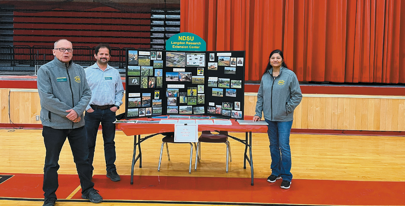 From right to left Randy Melhofff, Anitha Chirumamilla, and Venkata Chapara represent NDSU Langdon Research Extension Center. Photo by Shannon Duerr.