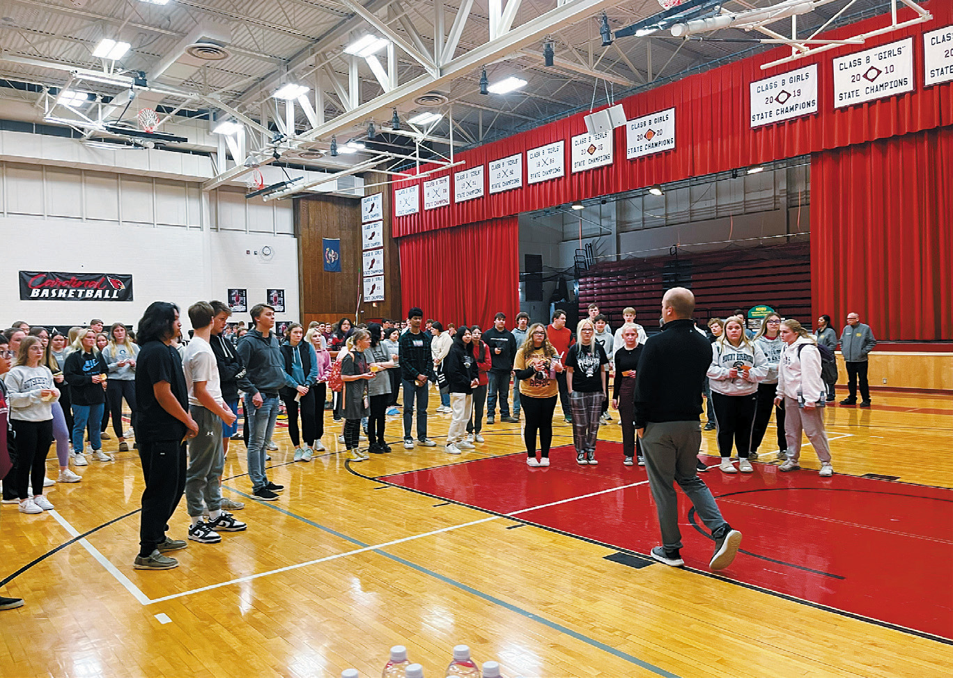 Ethen Askvig, Langdon High School principal, addresses students before the job fair. Photo by Shannon Duerr.