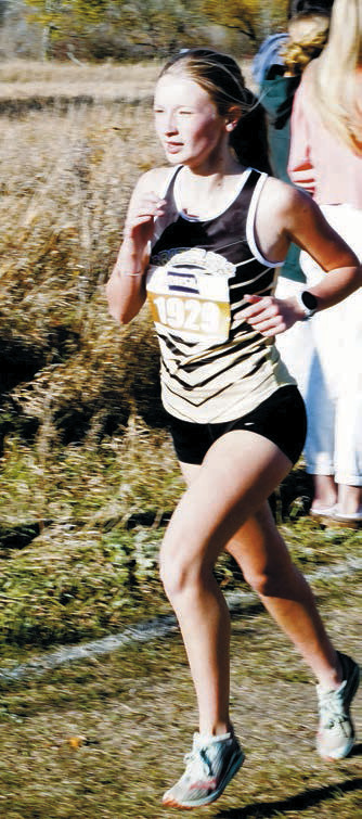 Emersen Helgoe ran to a 35th finish at the State Cross Country Meet on Oct 25. Photo by Larry Stokke.