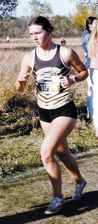 Delanie Denault finished 46th at the State Cross Country Meet on Oct 25. Photo by Larry Stokke.