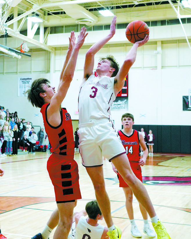 Player of the Game, Cody Amble, had a 16-point game against the Bearcats at home on Feb. 7. Photo by Larry Stokke.