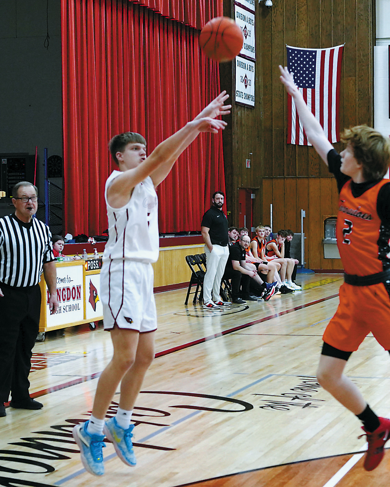 Levi Olson came into the game and dropped in a 3-point basket right away. Photo by Larry Stokke.