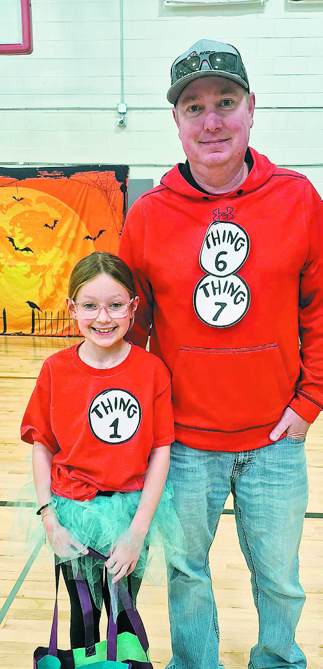 Kennedy and Michael Hartz as a group of “things” while attending the Spooktacular event.