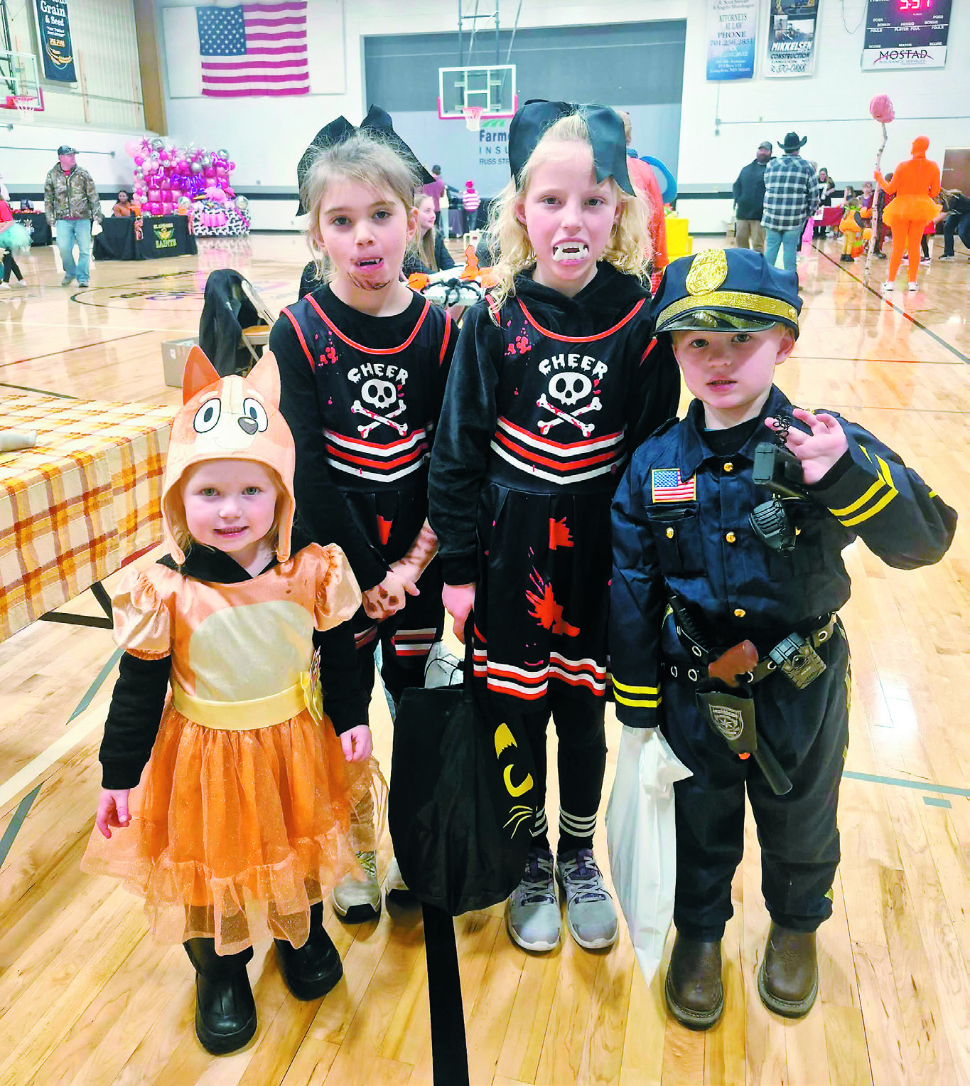 Jersi Witzel, Scarlyt Schaefer, Wesli J. Witzel, and Carsen Witzel show off their killer costumes while trick-or-treating at the Activity Center in Langdon.