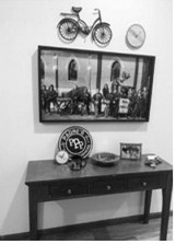 Father Phil Ackerman keeps a collection of mementos from his years in Langdon on display at the Holy Cross rectory in West Fargo. The display, affectionately dubbed his 'Langdon shrine,' reminds him daily of the friendships and memories he made while serving St. Alphonsus Parish.