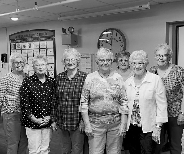 From (L-R) Francine Soli, Laurel Brusseau, Evie Mae Clark, Barb Schmidt, Paula Fassett, Darelene Roy, and Cheryl Anderson, the Hymns and Devotional ladies who visit PNC once a week to fill the hallways with praise songs.