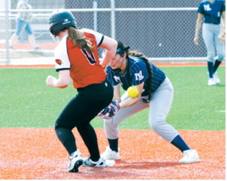 Kadence Wirth beats the throw to second base. Photo by Larry Stokke