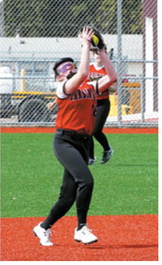 Harper Jacobson catches a pop fly for an out in the win over Northern Lights. Photo by Larry Stokke