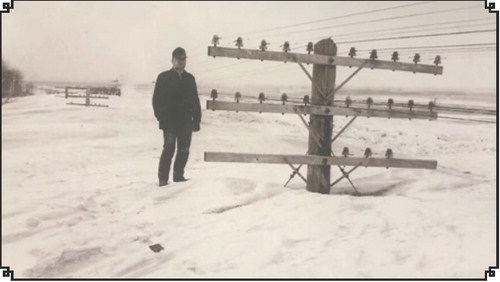 A picture is worth a thousand words: This iconic 1966 blizzard photo was taken near Linton, in south-central North Dakota. Pictured is Bill Koch, North Dakota DOT employee, standing next to a set of railroad telegraph poles. It was taken by fellow ND DOT employee Ernest Feland on March 9, 1966. Photo courtesy North Dakota State Historical Society/NOAA/NWS archives