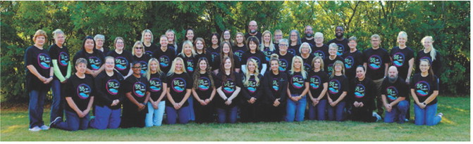 Langdon Prairie Health staff members gather for a group photo as the organization celebrates 55 years of providing health care to the community. Photo by Larry Stokke