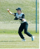 Noah Olson makes a barehanded catch in the outfield for an out against Grafton on May 8 in Pembina. Photo by Larry Stokke