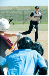 James Stevenson delivers a strike to the plate against a Grafton Spoilers batter. Photo by Larry Stokke