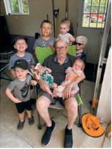 Great-grandpa Leo Beauchamp gathers with his great-grandchildren Torger and Ivan Olson; Cooper, Everett and Quinn Braunberger; Mason and Ava Schwartz; and Eleanore Beauchamp on Aug. 25 in Olga. Leo saves quarters in pill bottles for each of his great-grandchildren. Photo submitted by Diane Hanson