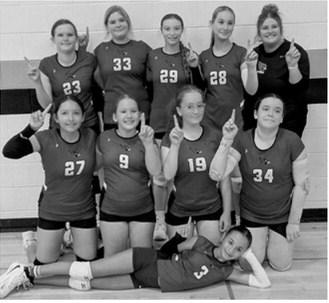 One of Langdon-Munich’s three junior high volleyball teams celebrates after winning its bracket at the Langdon Area Invitational on Saturday, Sept. 12. The tournament was held at Langdon Area High School and the Langdon Activity Center.
